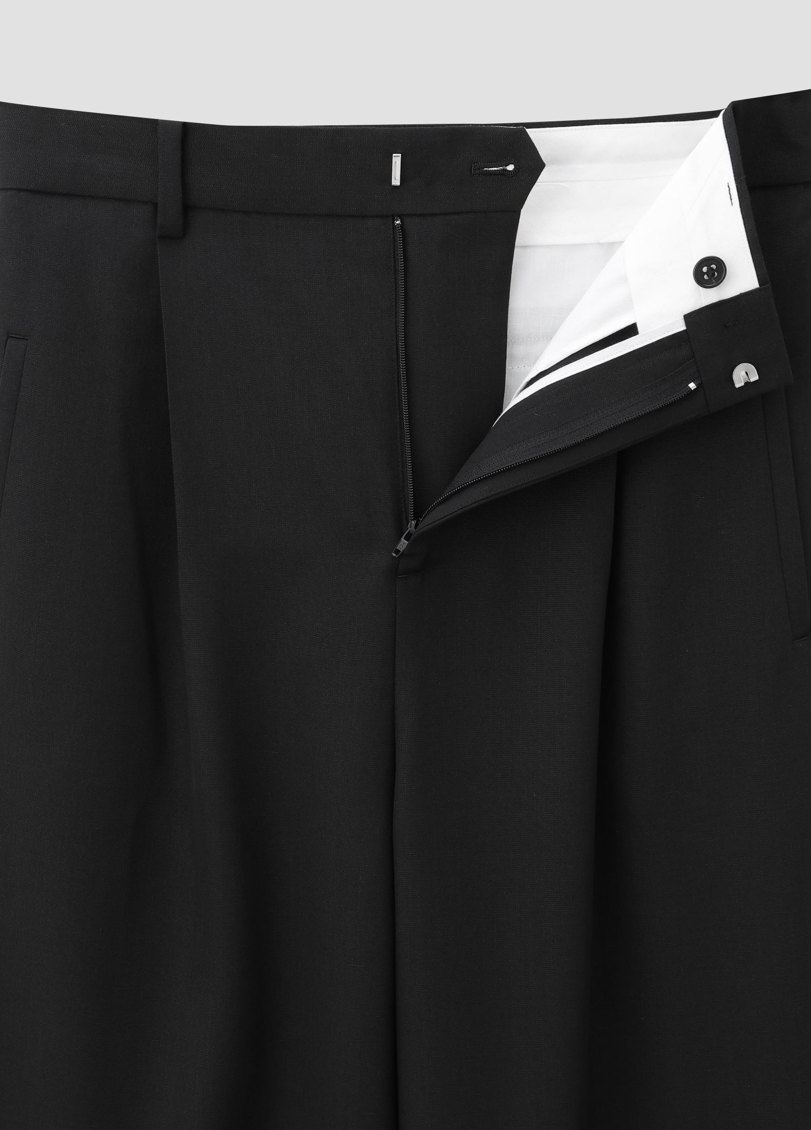 DISTRESSED WOOL TROUSERS